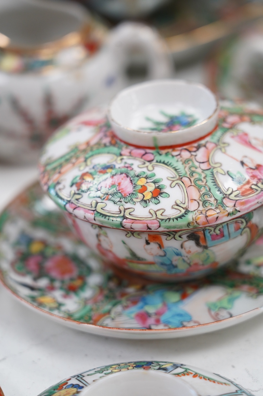 A quantity of mostly early 20th century Canton famille rose ceramics. Condition - poor to fair